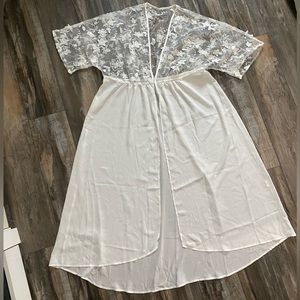 White robe/cover-up with floral detail